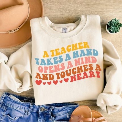 a teacher takes a hand opens a mind touches a heart DTF Transfer